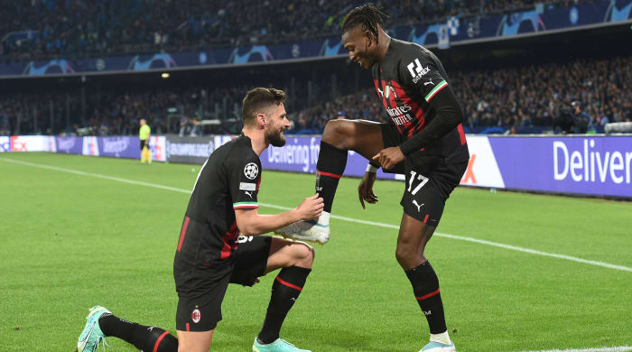 Rafael Leao and Olivier Giroud celebrate a goal.